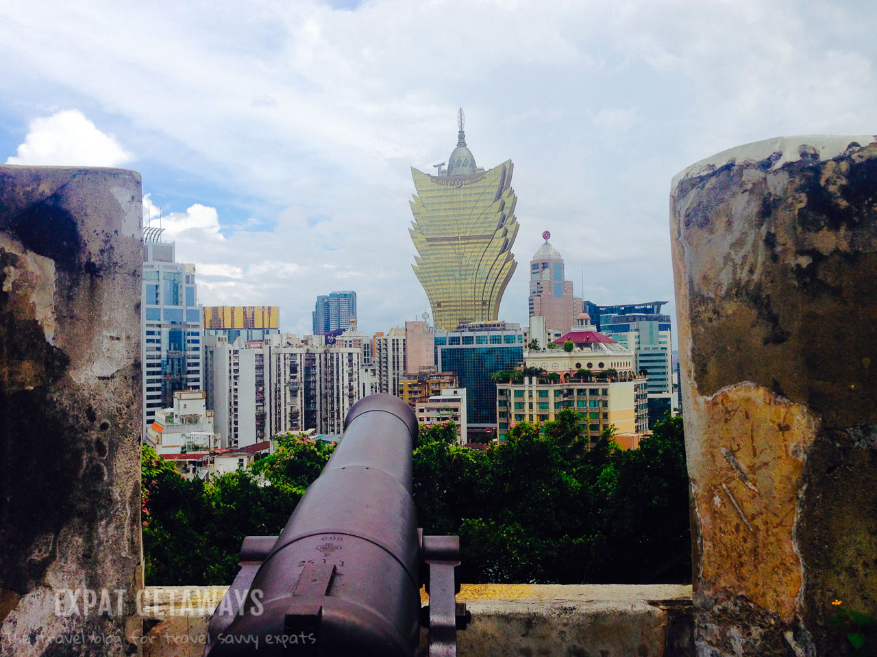 The old and the new in Macau. Canons at the Monte Fort were used to protect the Portuguese colony from pirates. 