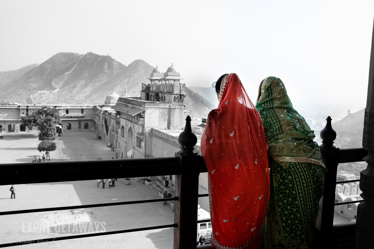 Women in Indian saris enjoying the view from the Amber Fort, Jaipur. Expat Getaways, 5 Nights Golden Triangle, Delhi, Jaipur & Agra, India.