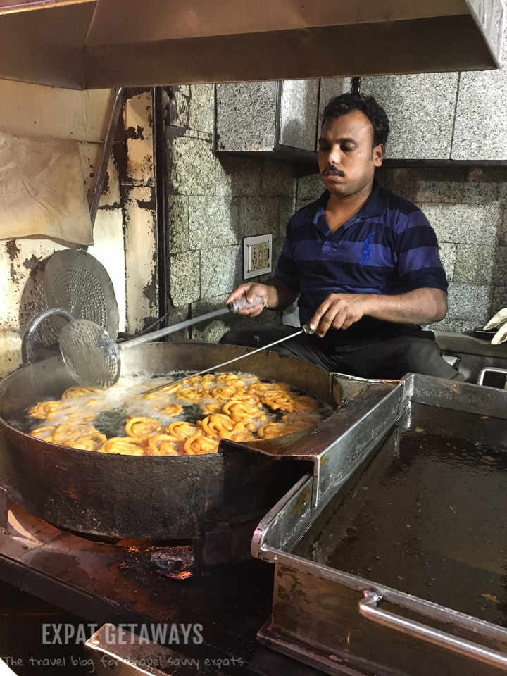 Our guide knew which street vendors he could trust to serve up delicious local food. Expat Getaways, 5 Nights Golden Triangle, Delhi, Jaipur & Agra, India.