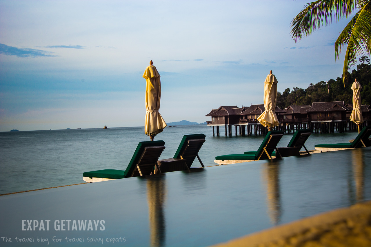 Relaxing by the pool... I think it is going to be a good day in Pangkor Laut Resort, Malaysia. 