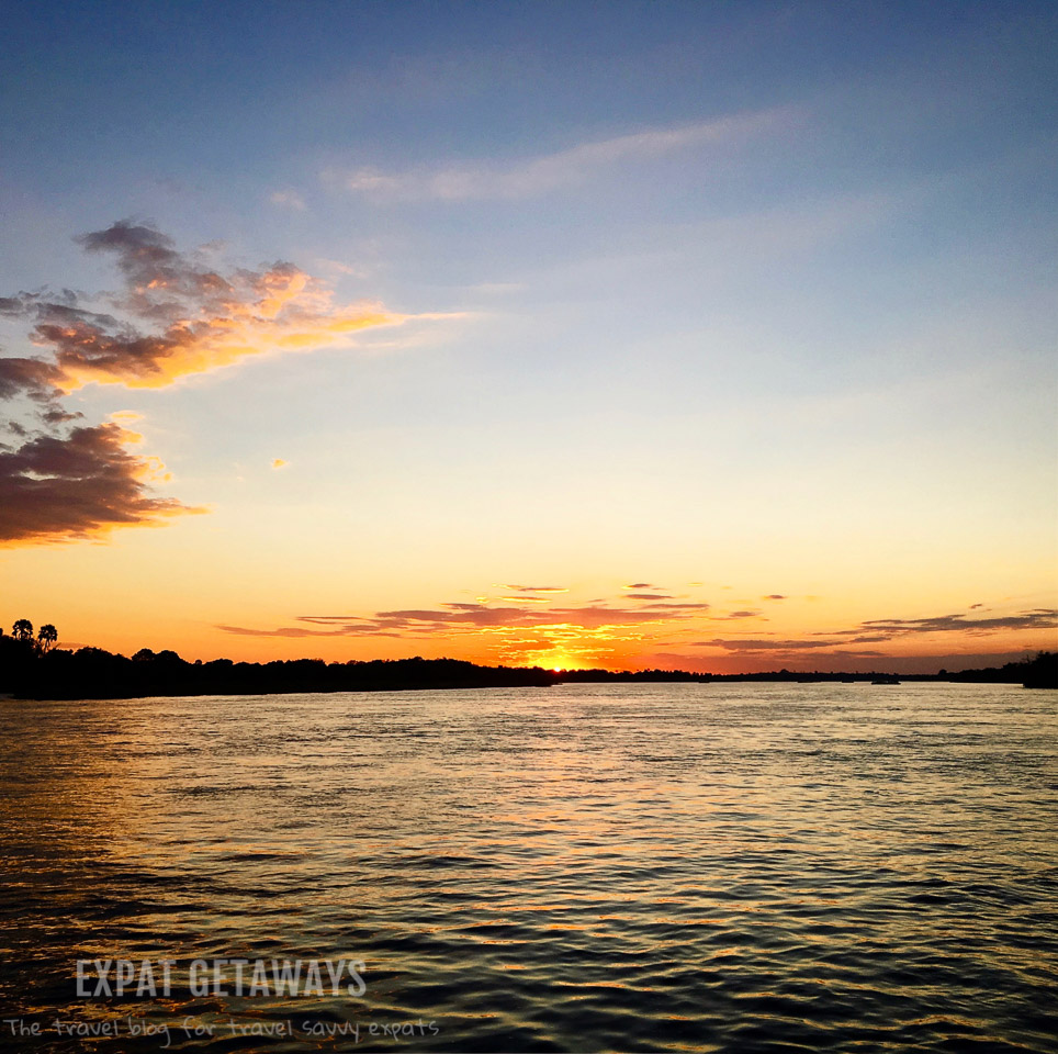 Africa offers up some of the most spectacular sunsets in the world. Zambezi River, Victoria Falls, Zimbabwe. 