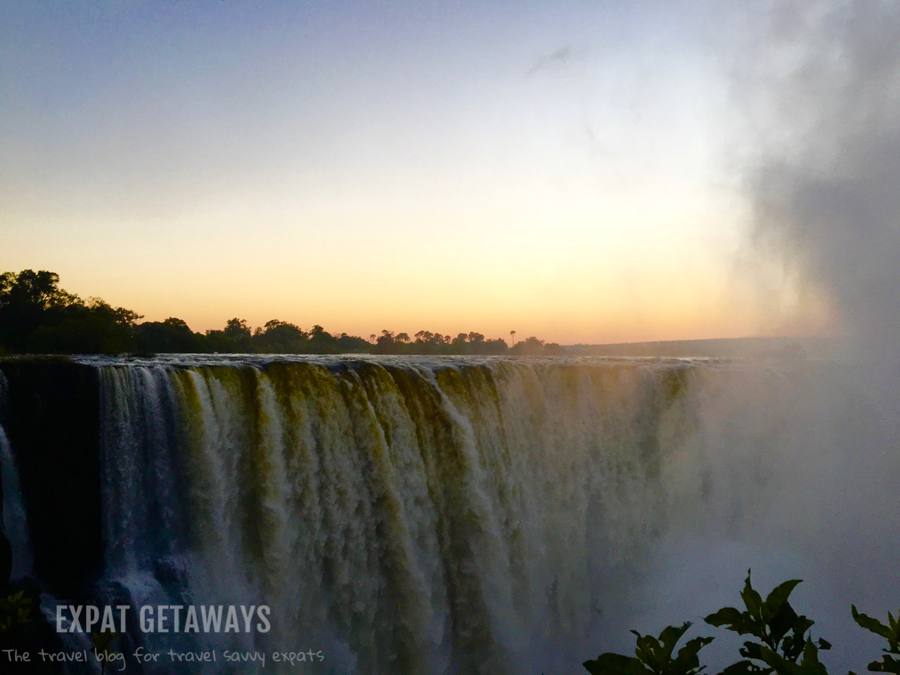 Get up early and get to Victoria Falls at sunrise. Victoria Falls, ZImbabwe. 