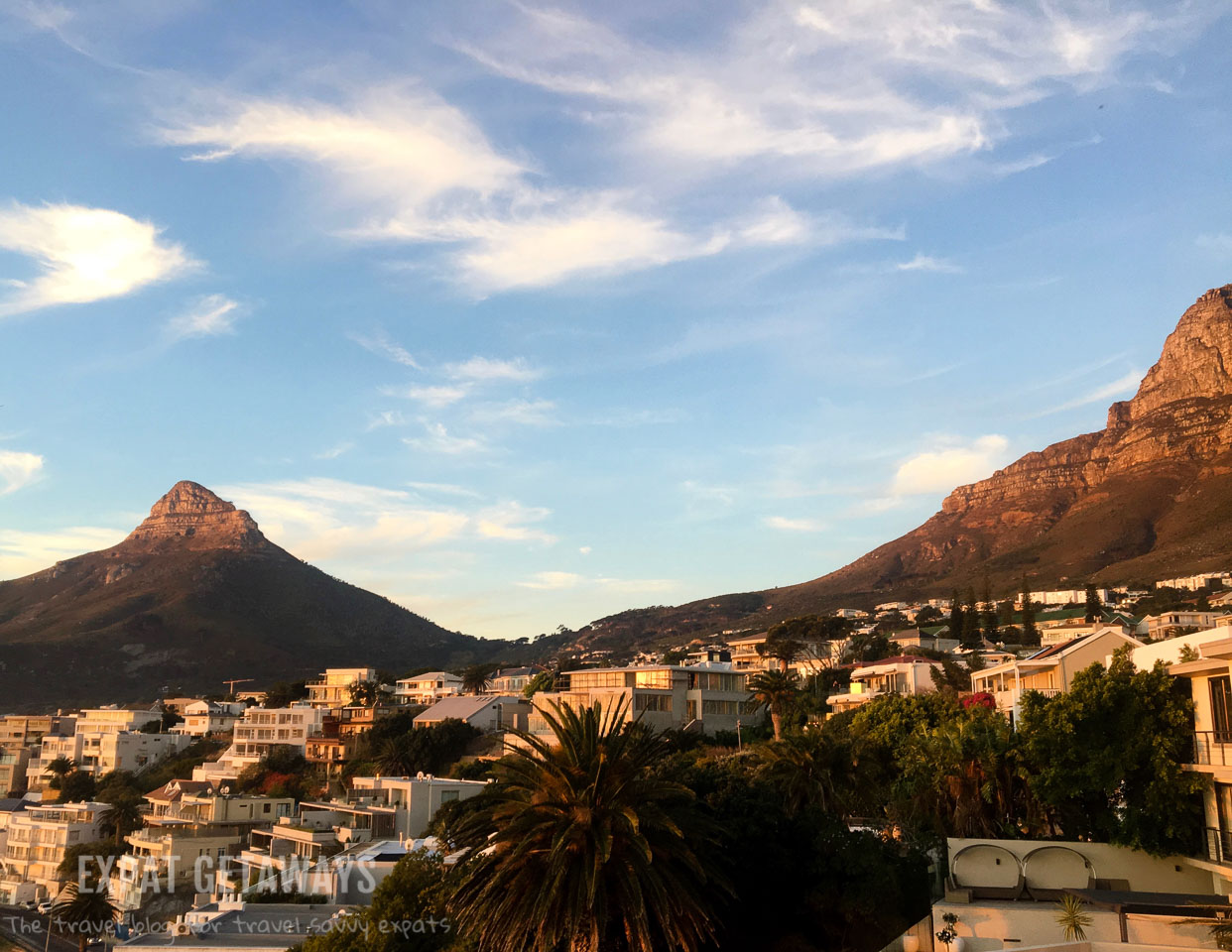 The view from our wonderful apartment in Camps Bay. Ocean views from our balcony and spectacular sunsets with Lions Head as a backdrop. Expat Getaways One Week in Cape Town, South Africa. 