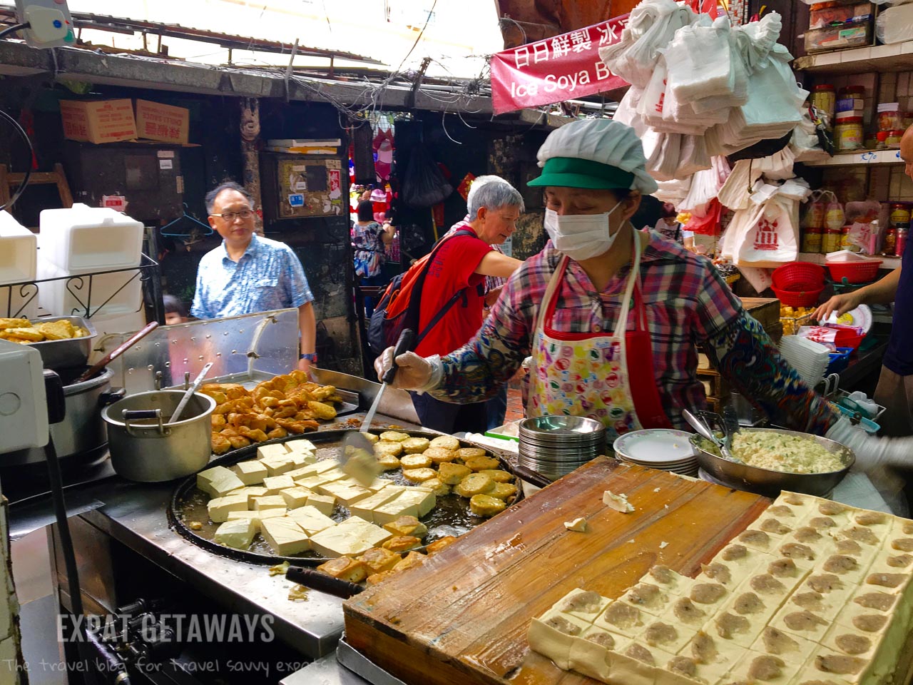 You'll often see workers cooking up a storm. Expat Getaways, First Time Survival Guide - Chinese food. 