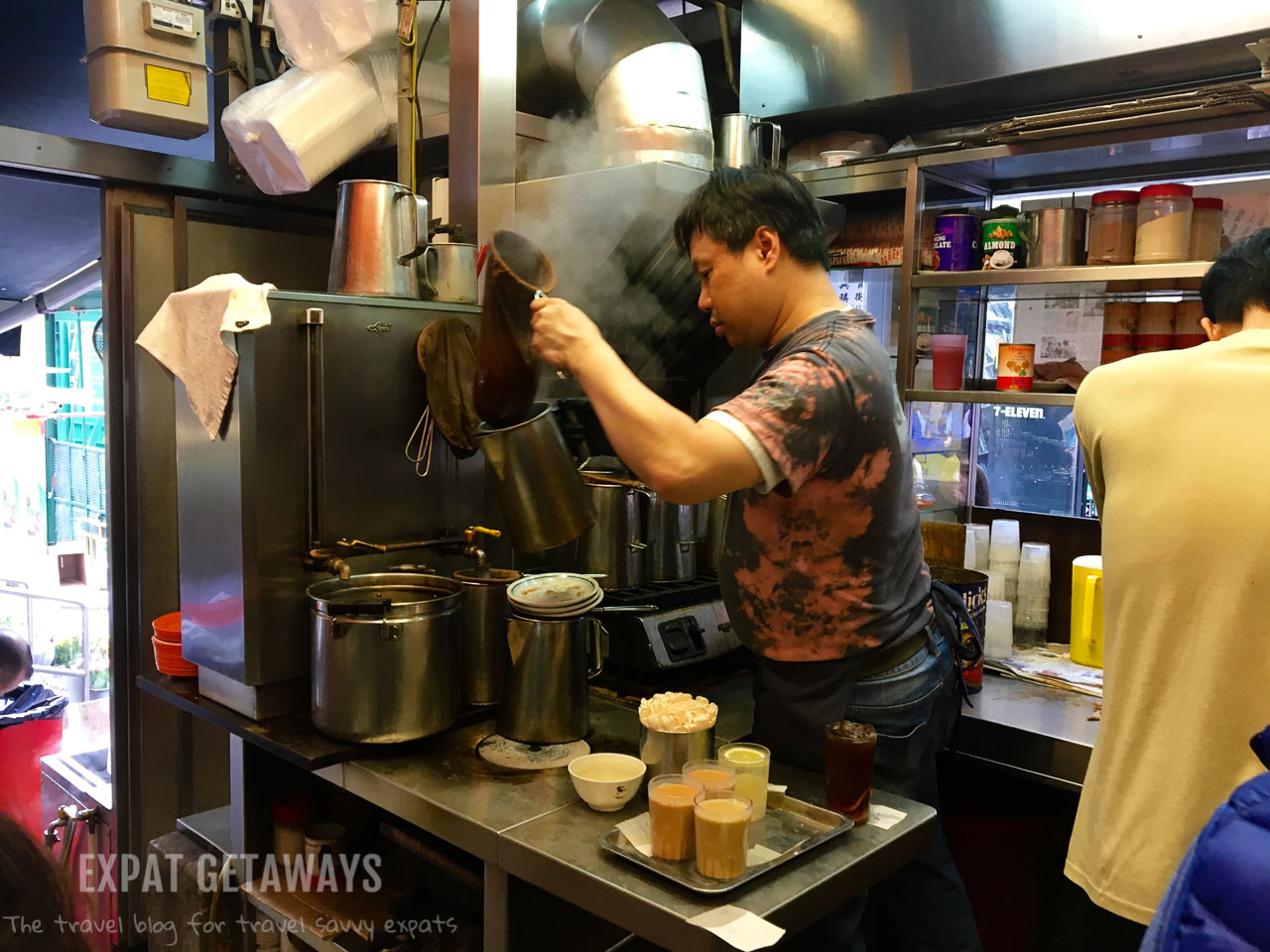 Strong tea is strained through a silk stocking before milk is added to make a Hong Kong style milk tea. Expat Getaways, First Time Hong Kong Survival Guide - Chinese food. 