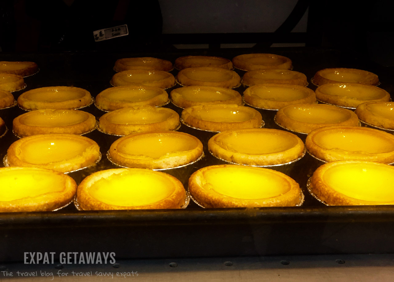 The classic Hong Kong egg tart. Expat Getaways, First Time Hong Kong Survival Guide - Chinese food. 