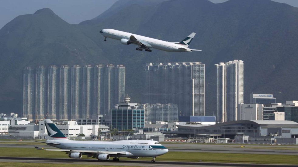 Photo Source: SCMP. Departing plane at Hong Kong International Airport. 