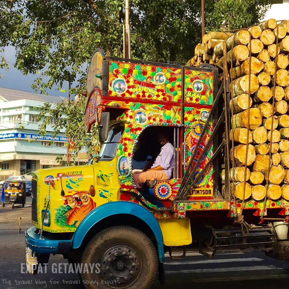 A colourful truck goes by on the streets of Muvattupuzha where Indian Summer House is located. Expat Getaways - One Week in Kerala, India.